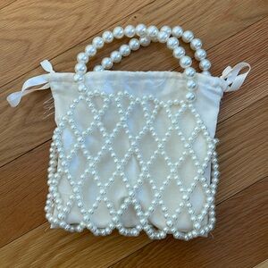 White pearl clutch